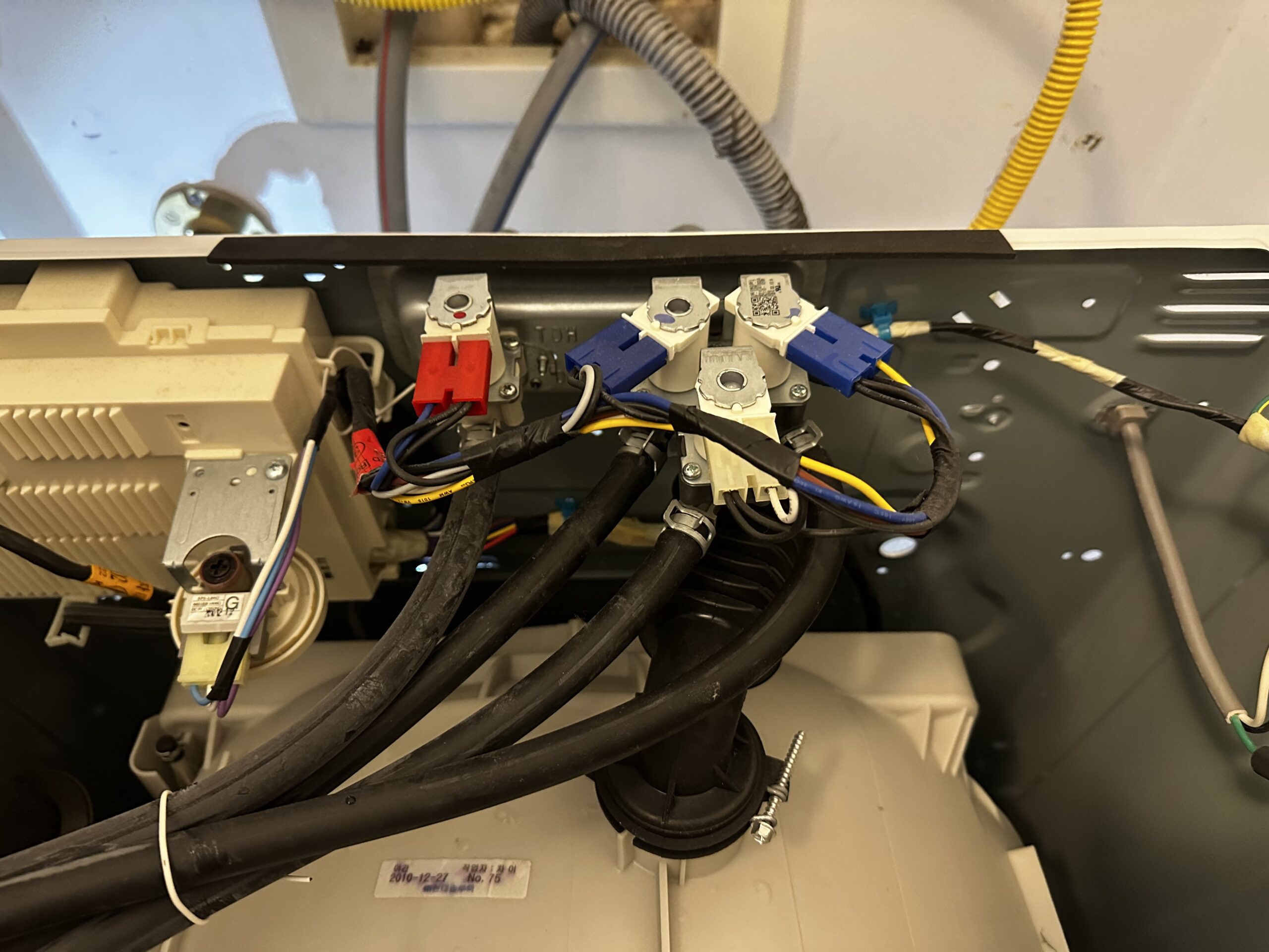 washing machine repair in Cornelius NC showing internal washer components