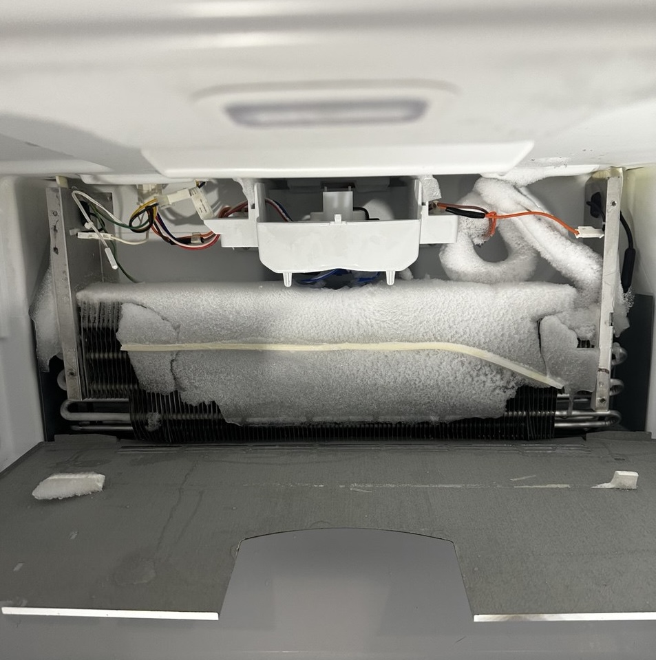 freezer repair in cornelius nc by local technicians diagnosing frost buildup